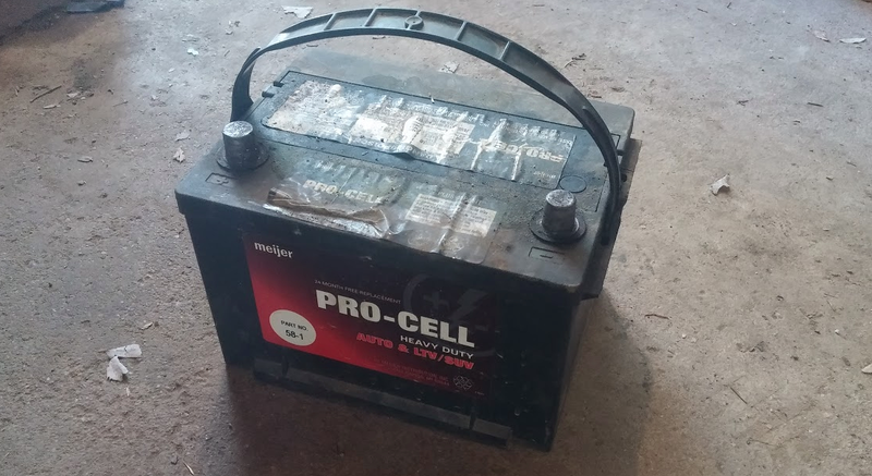 A typical 12 volt car battery.